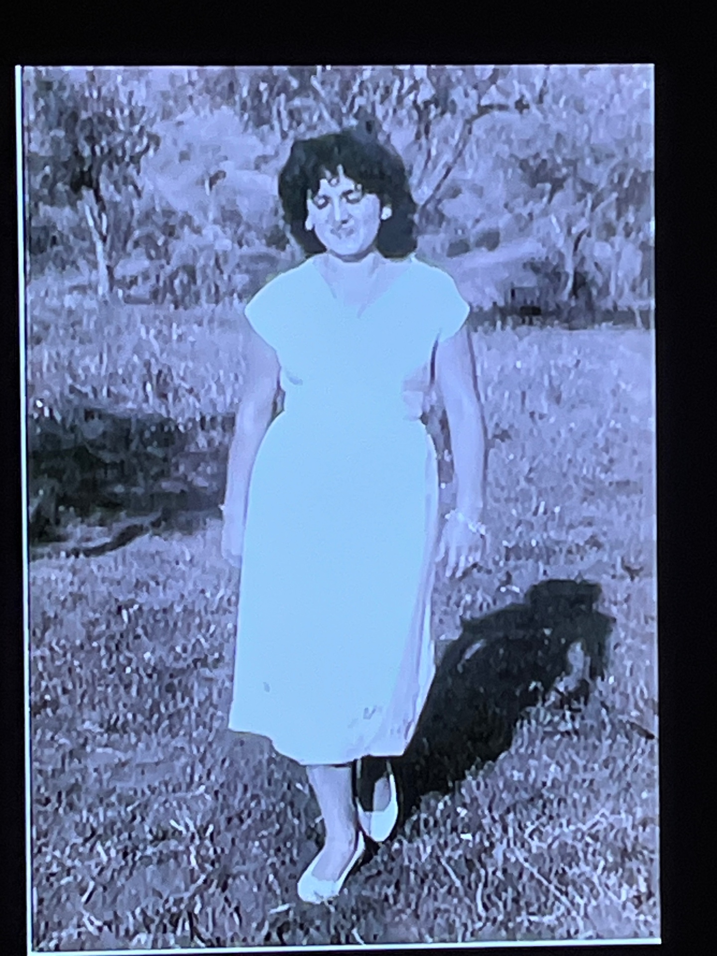 A young Titina Magnelli standing outdoors
